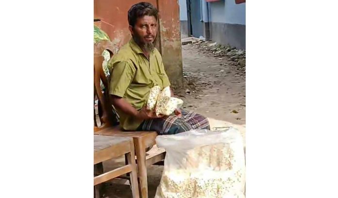 এক প্রতিবন্ধী পপকর্ন ভাজা বিক্রেতার জীবন আলেখ্য